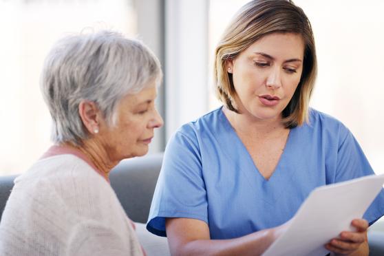 Doctor explaining breast cancer screening to a patient