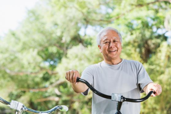 Older man riding a bike