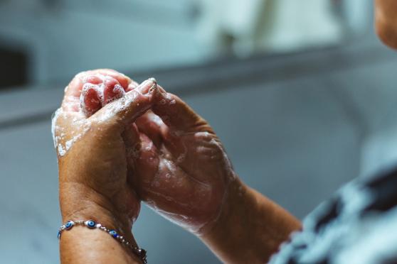 Closeup of woman washing hands